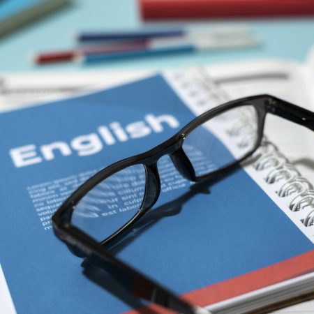 english-book-with-glasses-table-min Best coaching institute in Chennai. Genesis Academy Chennai India